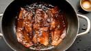 mediterranean-style pomegranate-glazed pork belly strips