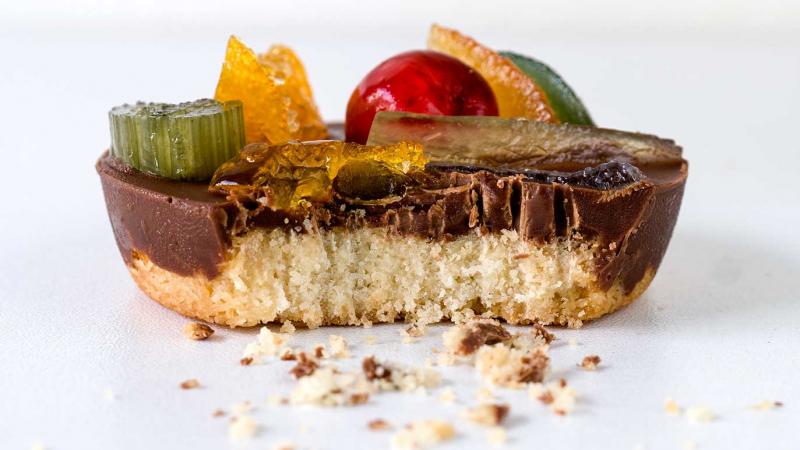 candied fruit and milk chocolate topped cookies